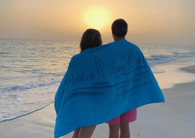 Anna-Maria-Island-Harbor-Lane-Court-Rental-towel-in-the-sunset