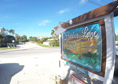 Slide Show Anna-Maria-Island-Harbor-Lane-Court-Rental-sign-2